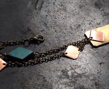 Necklace with brass and copper rectangular pieces with turquise
