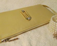 A golden leather clutch