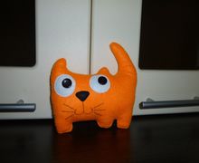An orange toy cat