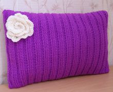 A pillow decorated with flowers
