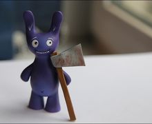 A ceramic bunny with an axe