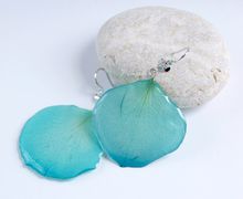 Earrings made of colored rose petals