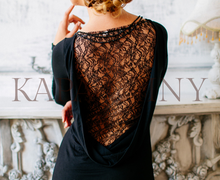 Jersey dress with a lace inset on the back