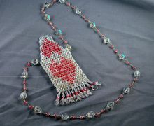 white with pink heart amulet bag