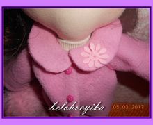 Textile handmade doll.