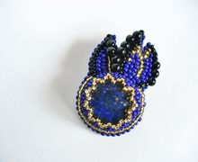 A pin "Shooting star" with lazuli