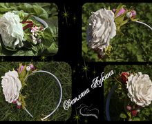 A headband with roses and berries