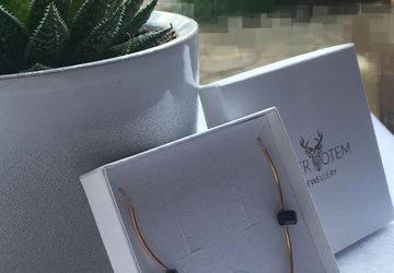 14k gold filled tube chain necklace with black swarovski pendulum beads