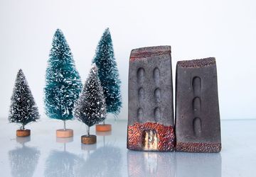 Black Ceramic raku art buildings with copper details