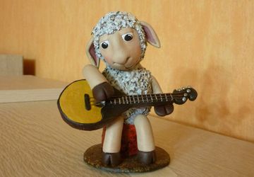 A sheep with a domra