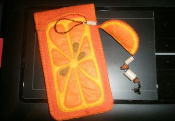 A phone case with a charm