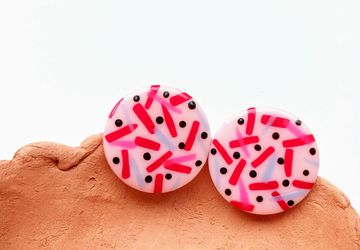 Big round 80s style polymer clay studs in carmine red, neon pink and pink tones