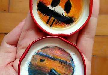 hand painted landscapes in bottle caps