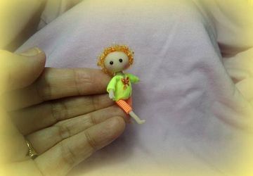 One of a kind miniature lovely posable doll toy for dollhouse.
