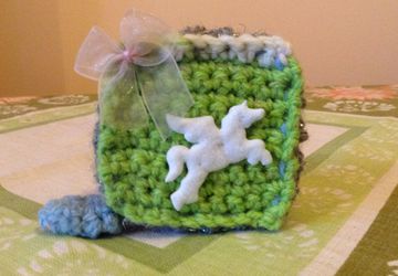Dress makers tape measure in a beautiful crochet case