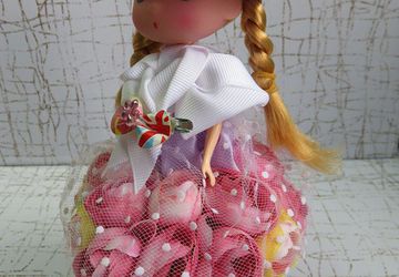 FLOWER DRESSED DOLL, THE DOLL IN PINK