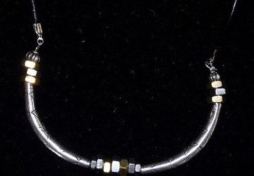 NECKLACE: Stainless Steel. Tubes and Nuts. Industrial Design.