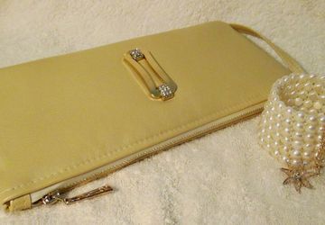 A golden leather clutch