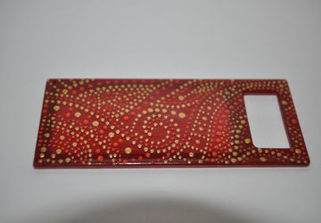 Compact mirror in spot painting technique