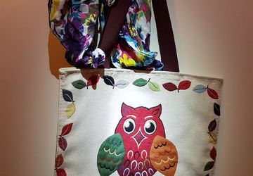 Handmade fabric bag with a colorful owl