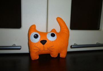 An orange toy cat