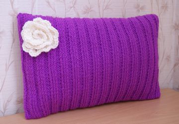 A pillow decorated with flowers
