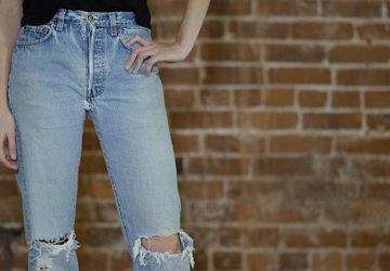 Transform an old pair of jeans into shorts.