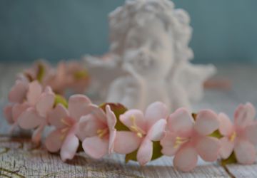 A headband with cherry flowers