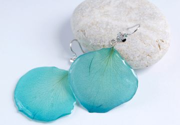 Earrings made of colored rose petals