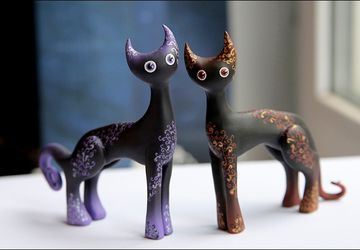 Fragile ceramic cats