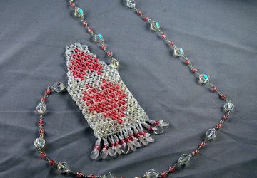 white with pink heart amulet bag
