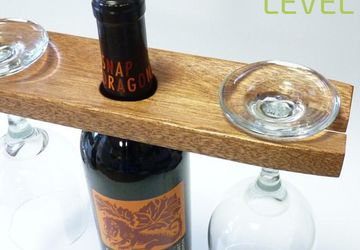 A small holder for wine bottle and glasses