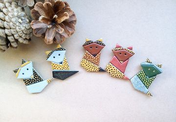 Full body origami style fox brooche made from polymer clay