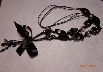 A jewel of beads and cord