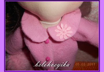 Textile handmade doll.