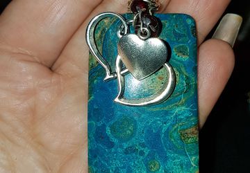 Crystal  sea sedment and garnet pendant