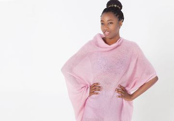 Fine knit semi-transparent mohair knit poncho in tender pink