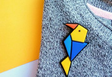 Origami style bird brooch handmade from polymer clay