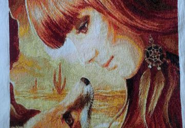 Completed girl and fox cross-stitch embroidery