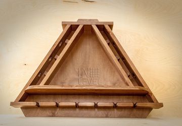 A holder for wine bottle and glasses