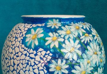 A blue round vase (decoupage)